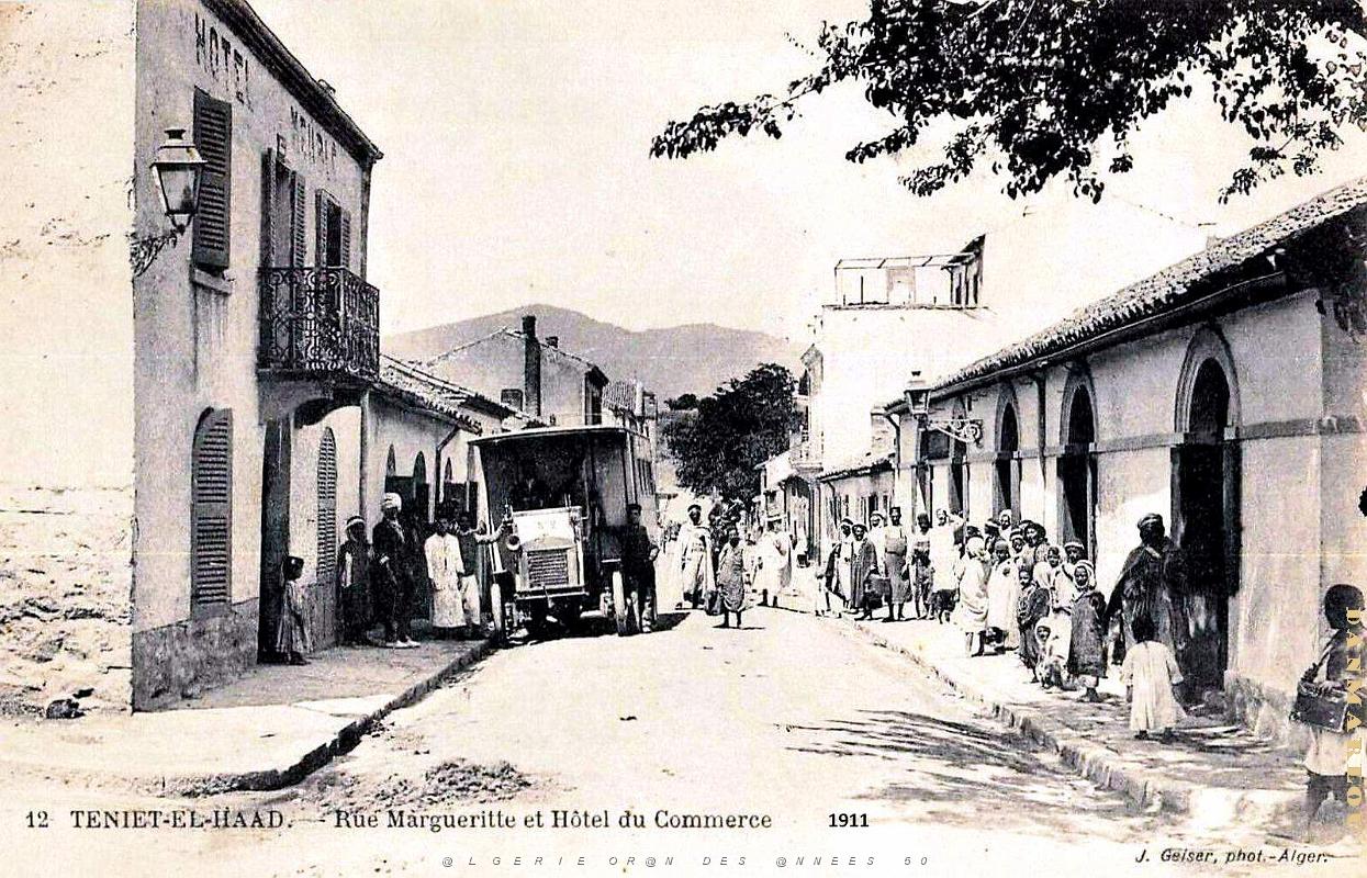 2356- Teniet-El-Haad - Rue Margueritte et Hotel du Commerce - 1911.jpg